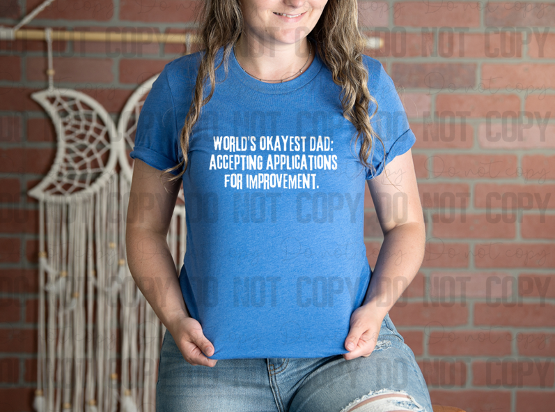 06-53 World's Okayest Dad Accepting Applications For Improvement White Completed Tee