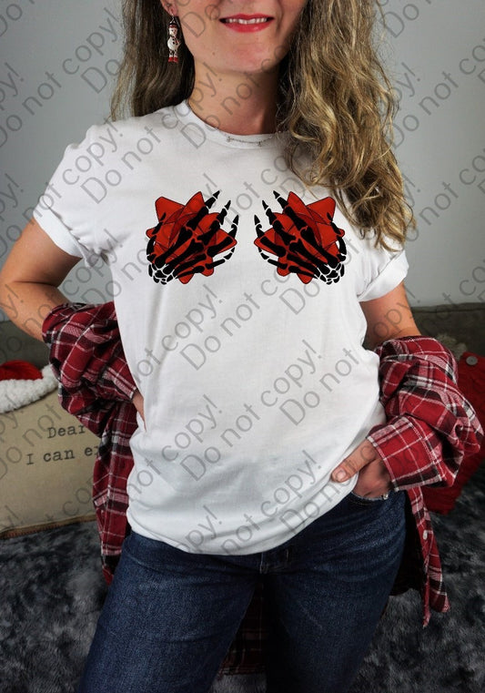 12-405 Skeleton Hands Christmas Bows - Red tee