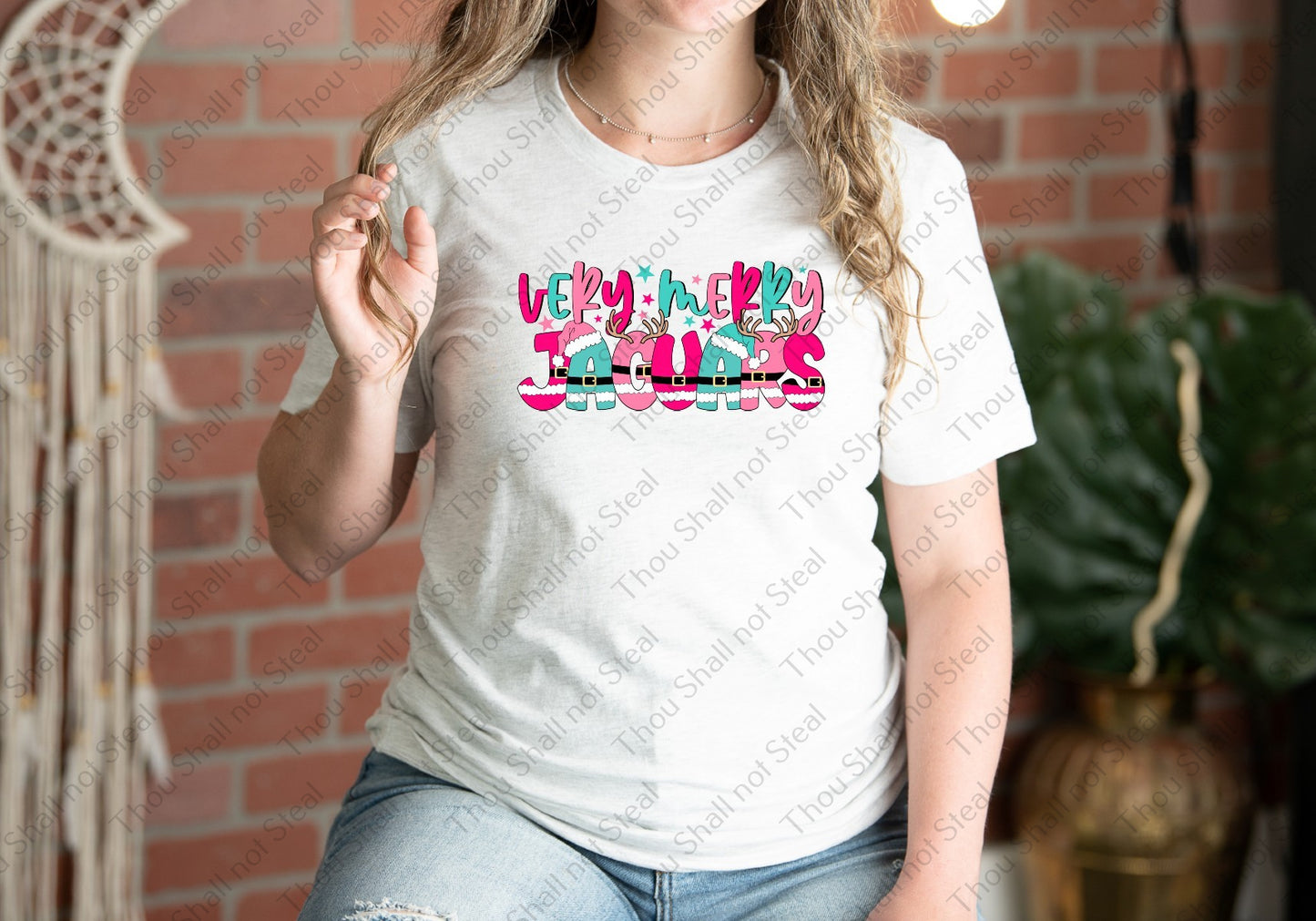 58-16 Very Merry Jaguars tee