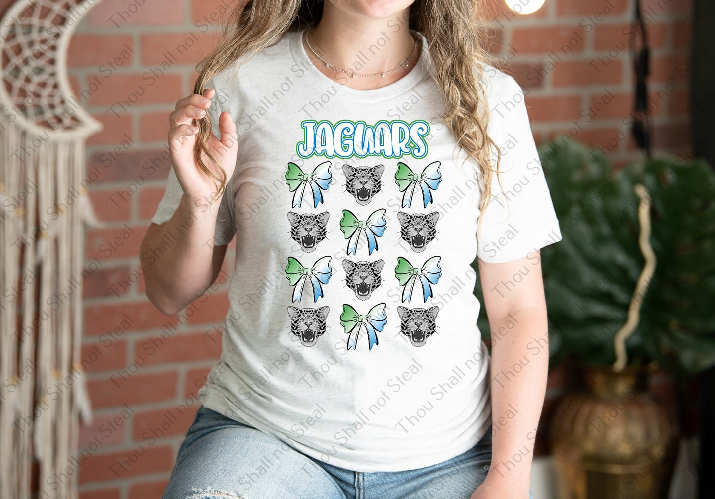 58-19 Jaguars coquette tee