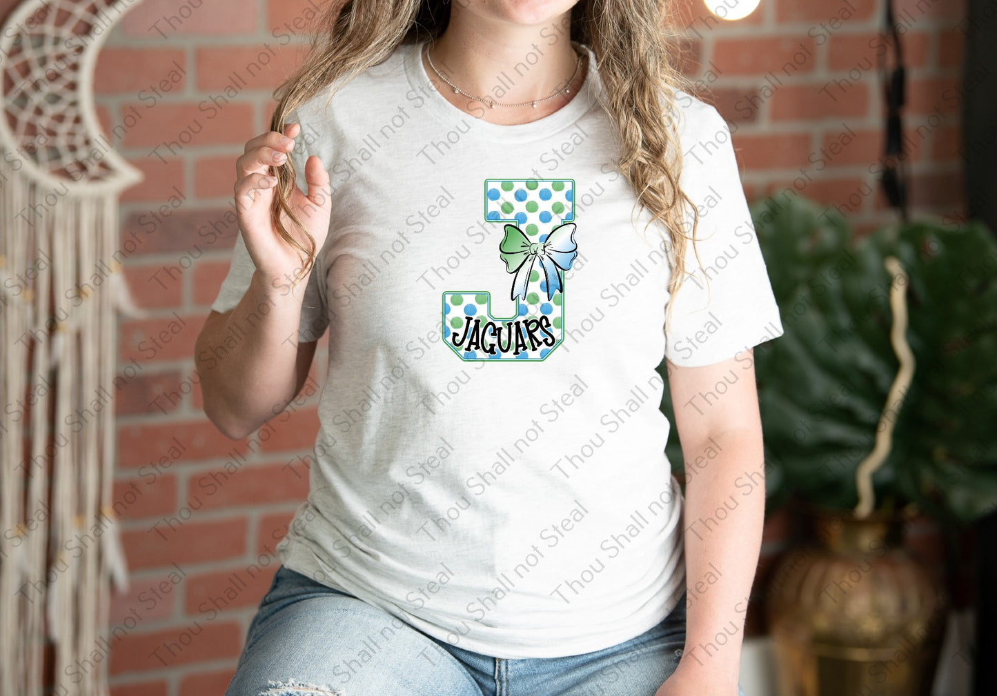 58-20 Jaguars Polka Initial tee