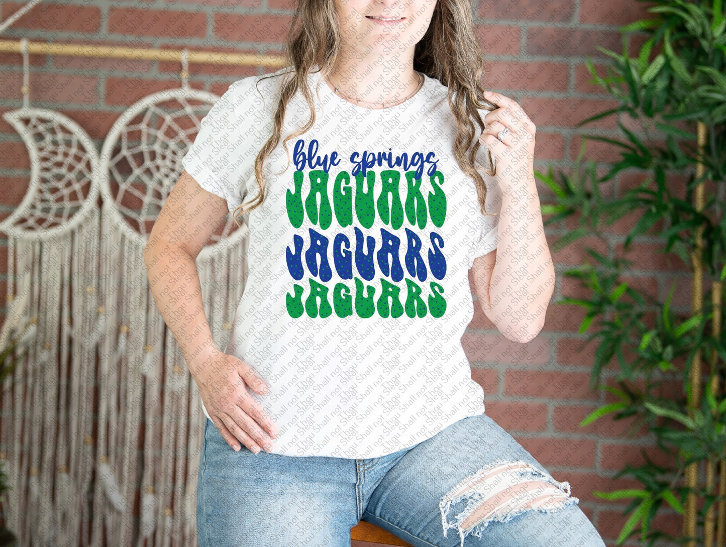 58-39 Blue Springs Jaguars - wavy text tee