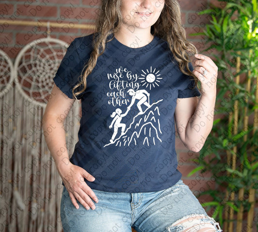 D-119 C White - We rise by lifting each other tee