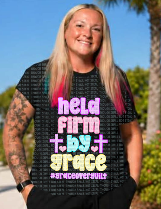 D-195 Held Firm By Grace Tee